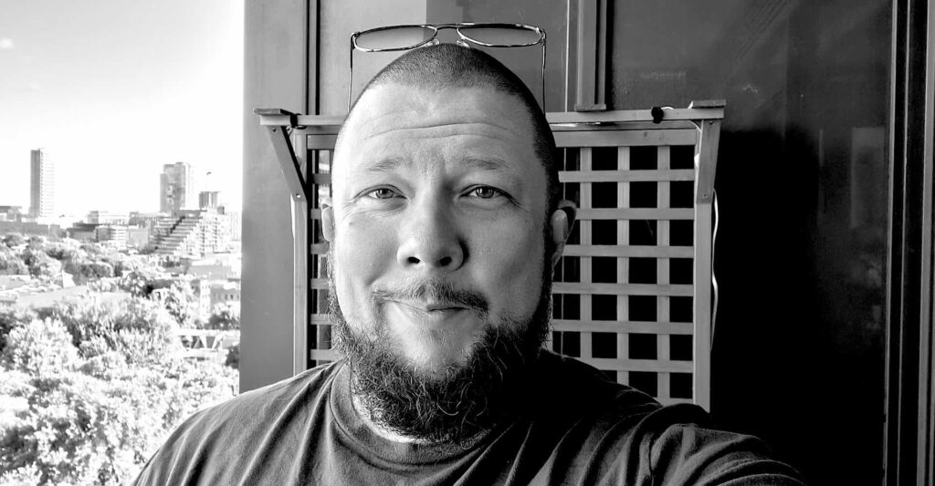 A black and white image of Paul Austin-Menear, the Founder of Six Catalysts. Nice fellow. You should work with him, he knows what he's doing.